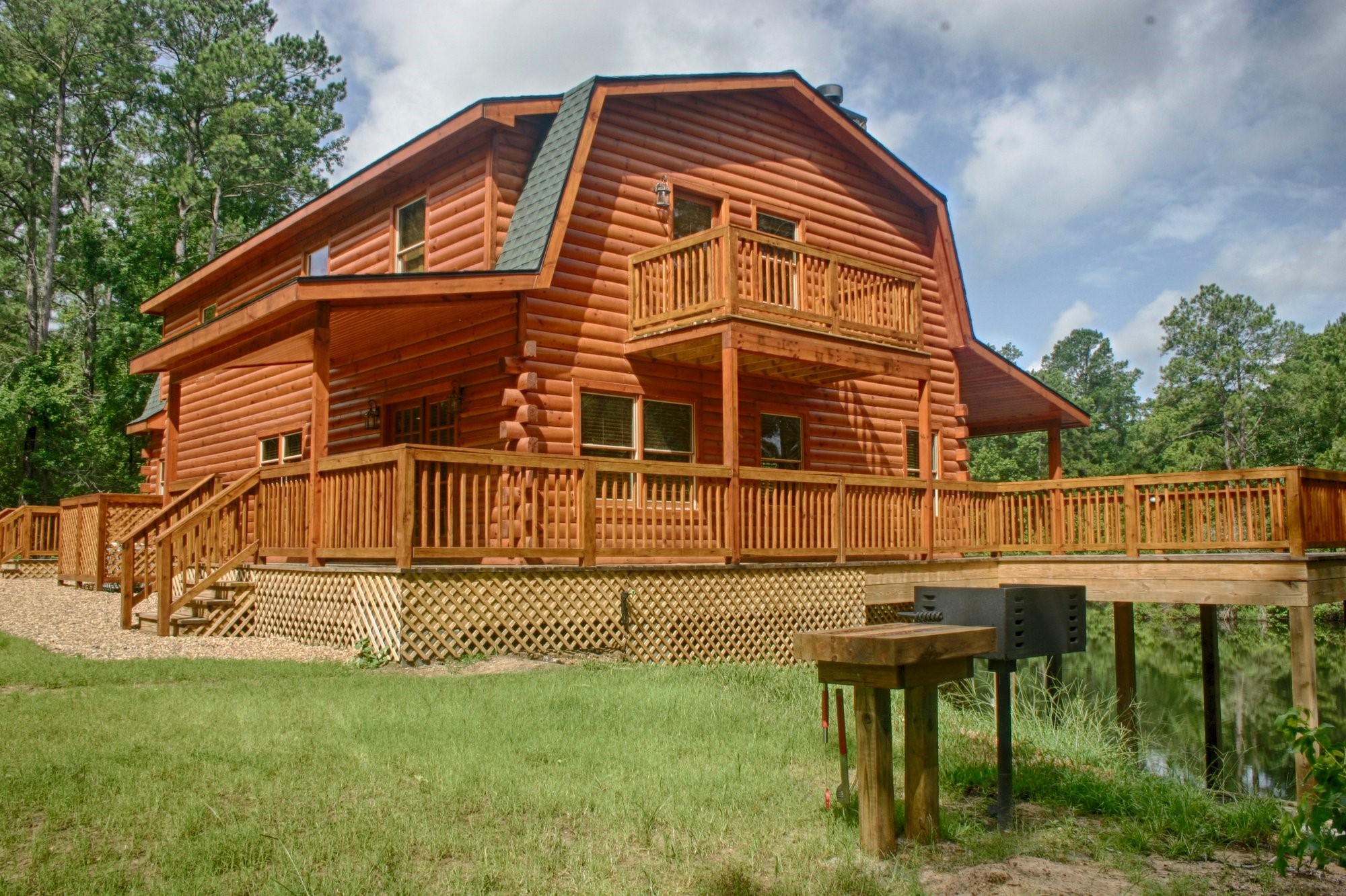 91 Bluejay Way Cleveland, TX 77327 - Photo 5 of 35 a view of a house with a yard