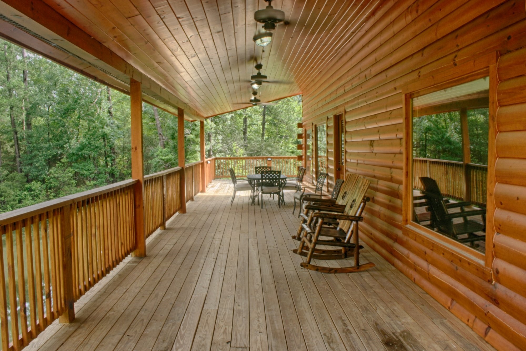 91 Bluejay Way Cleveland, TX 77327 - Photo 6 of 35 a view of a chairs and table in the balcony