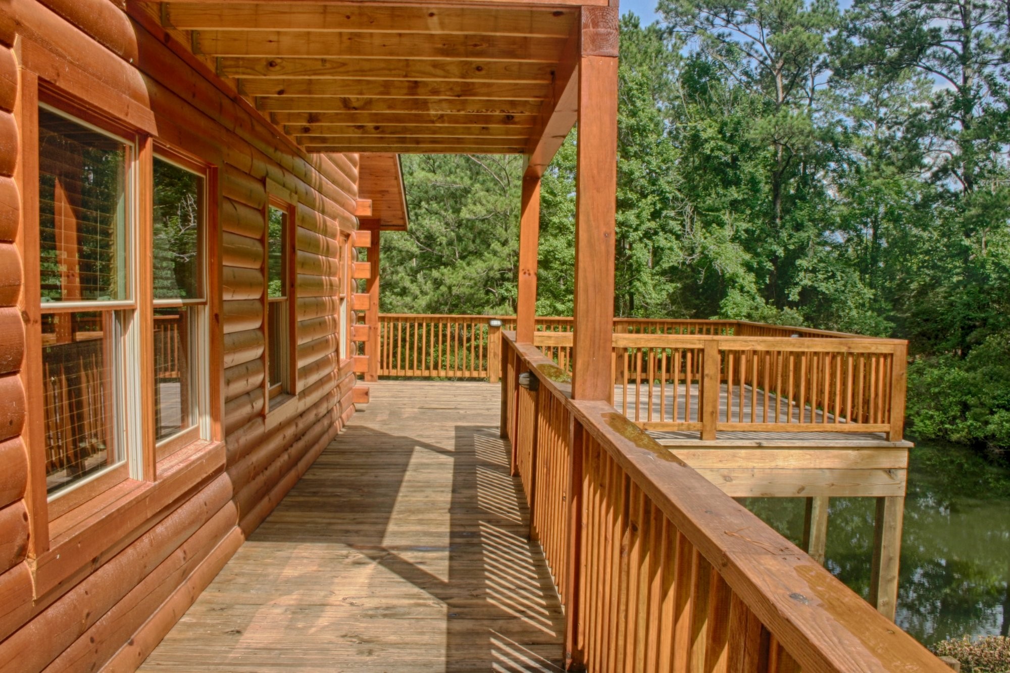 91 Bluejay Way Cleveland, TX 77327 - Photo 9 of 35 a view of balcony with wooden floor