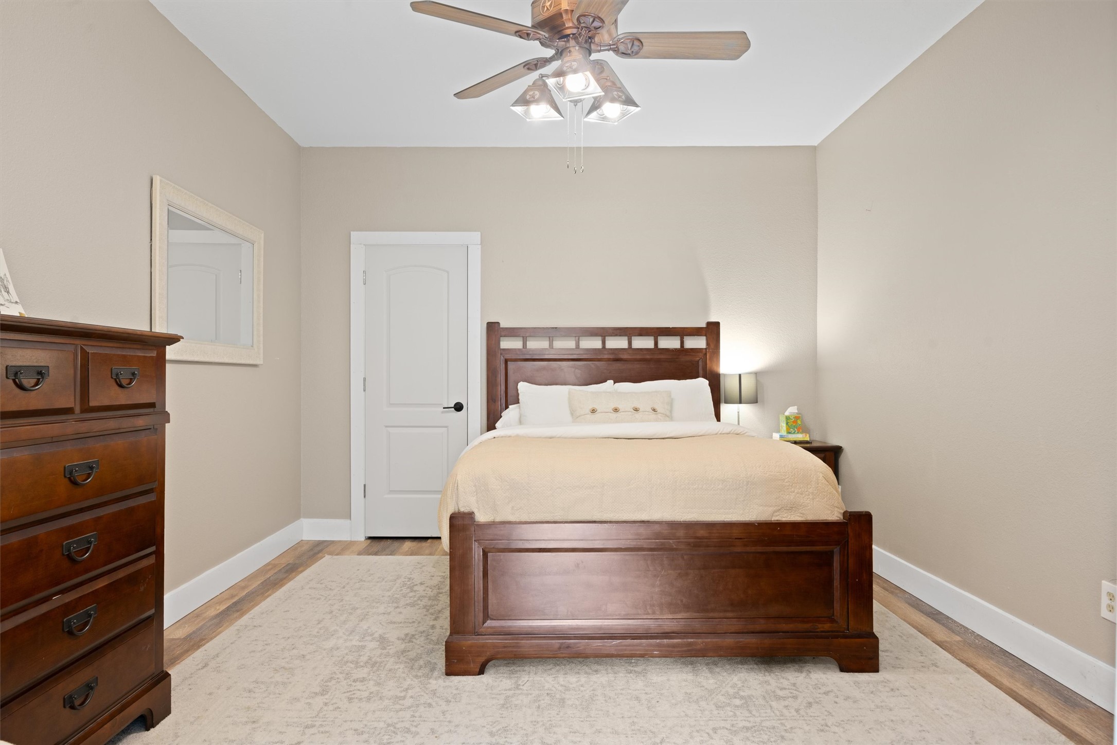 13590 Ranch Road 2338 Georgetown, TX 78633 - Photo 13 of 39 Bedroom #2 is in the hallway on the left of the family room area, it has a large closet, and it could be an office space as well. The 2nd bathroom is right across the hall.