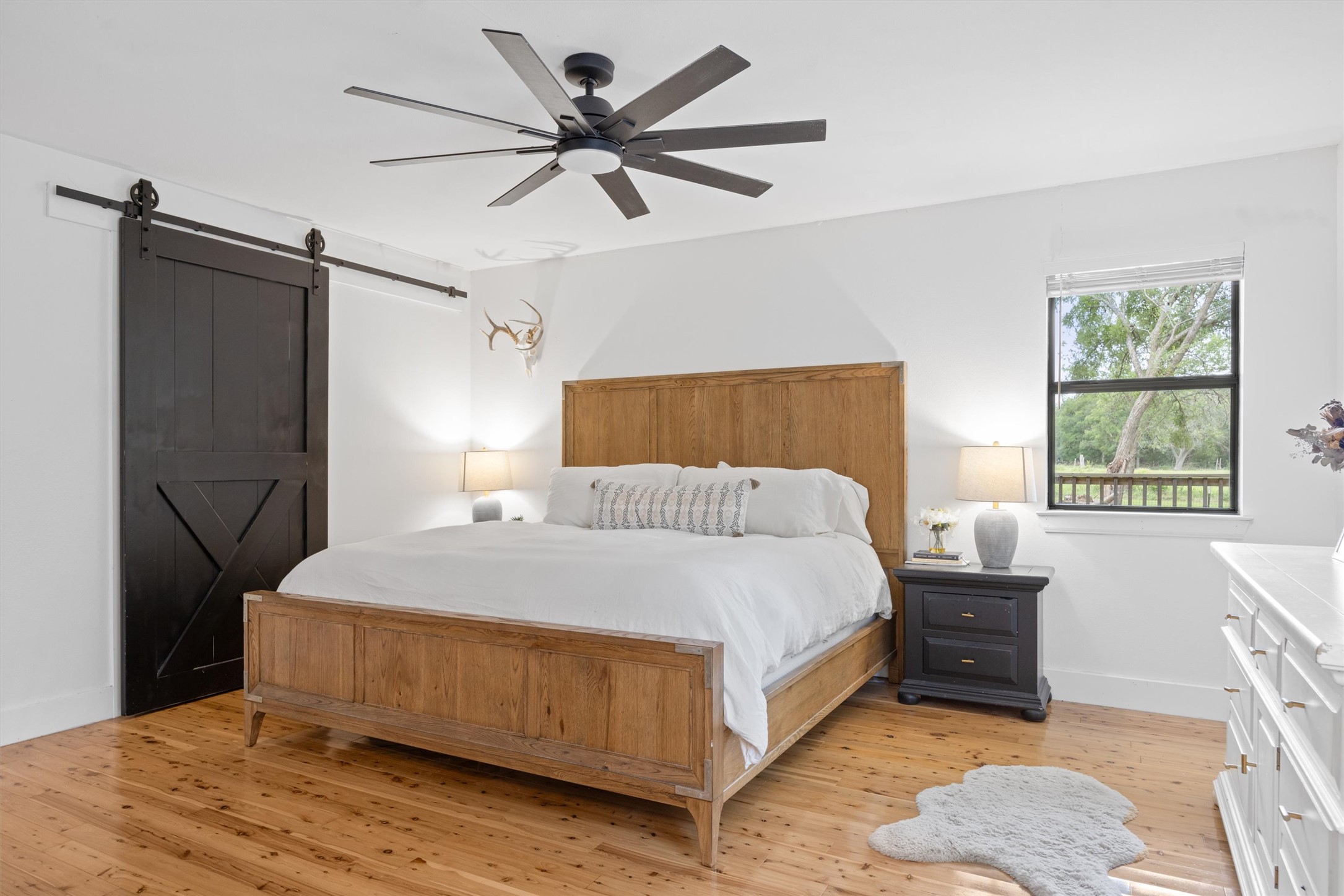 13590 Ranch Road 2338 Georgetown, TX 78633 - Photo 18 of 39 Barn door is the very large walk-in closet that measures approx 10'7" x 5'8".