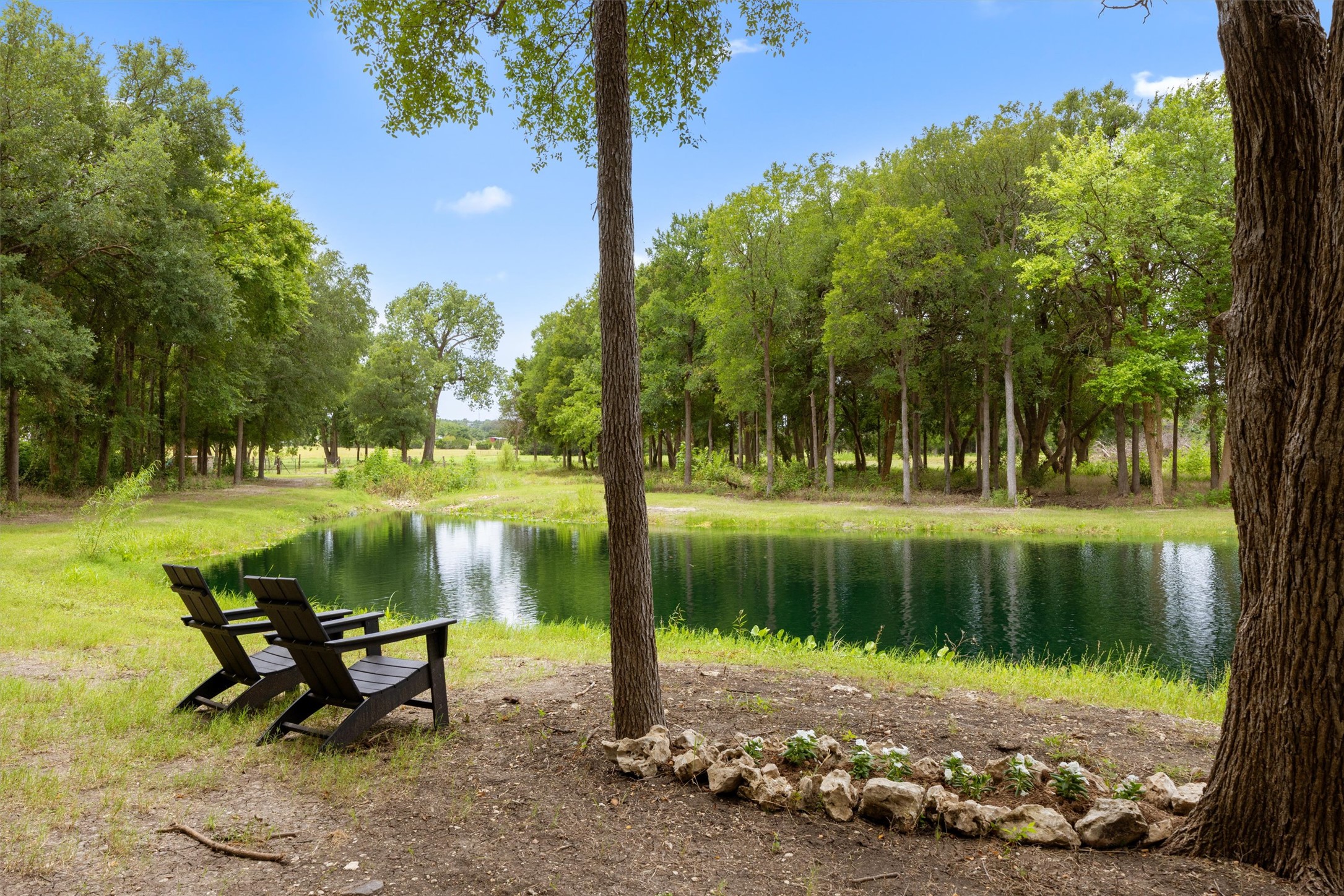 13590 Ranch Road 2338 Georgetown, TX 78633 - Photo 27 of 39 Another view of the pond, great to relax and enjoy nature.