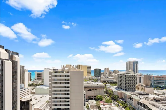 a view of a city with tall buildings