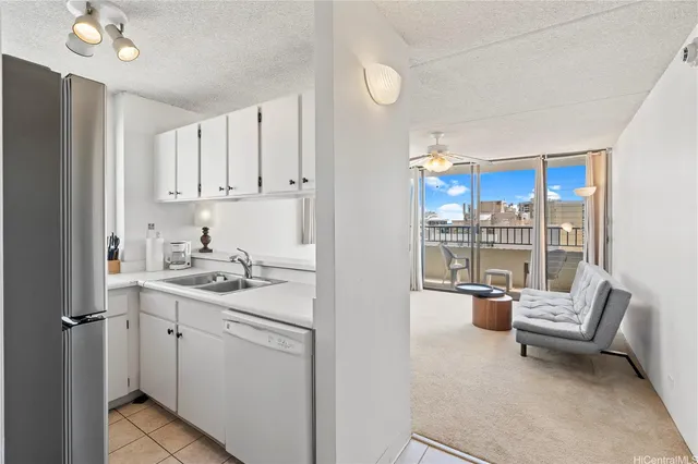 a view of kitchen with cabinets and outdoor view