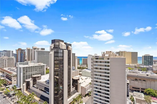 a view of a city with tall buildings