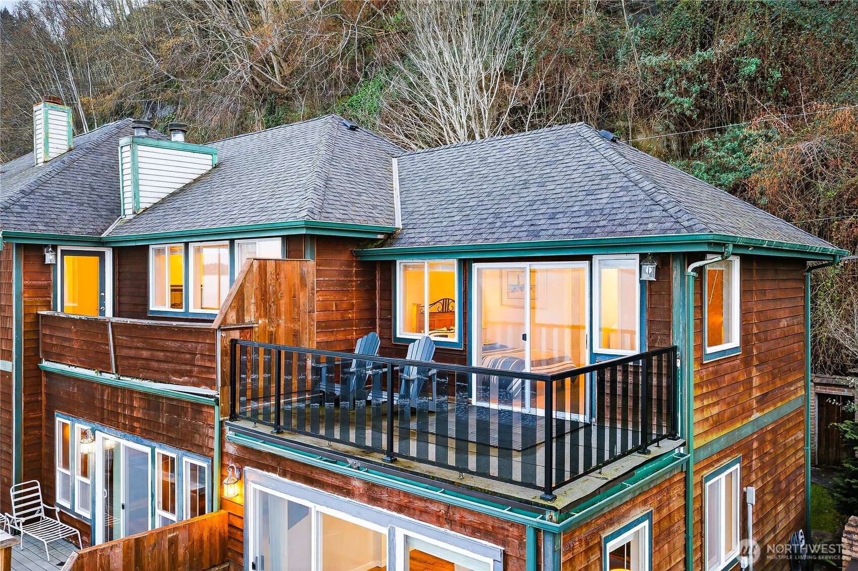 5972 Hastings Road Clinton, WA 98236 - Photo 3 of 40 a view of a house with a roof deck