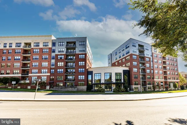 a front view of a building with street view
