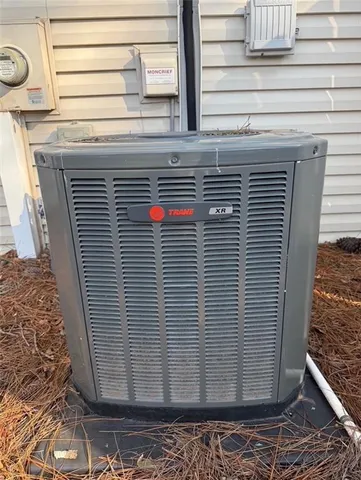 a view of a yard with lots of bushes
