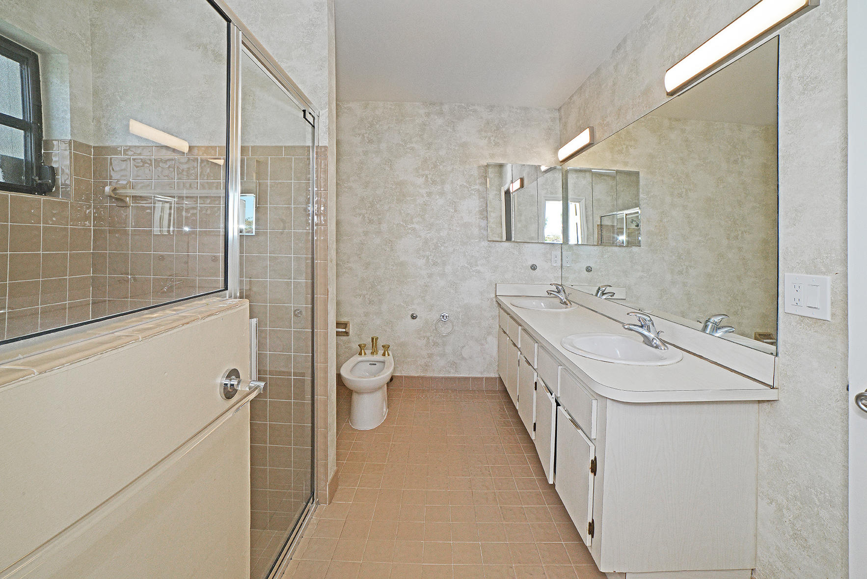 9053 Old Pine Road Boca Raton, FL 33428 - Photo 36 of 42 a bathroom with a double vanity sink toilet and shower