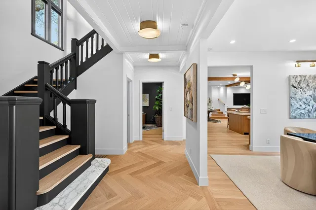 a view of a hallway view with staircase