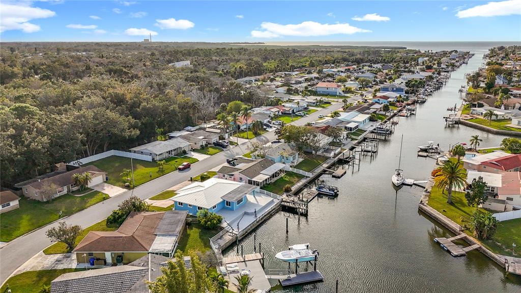4869 Shell Stream Boulevard New Port Richey, FL 34652 - Photo 5 of 46 an aerial view of residential houses with outdoor space