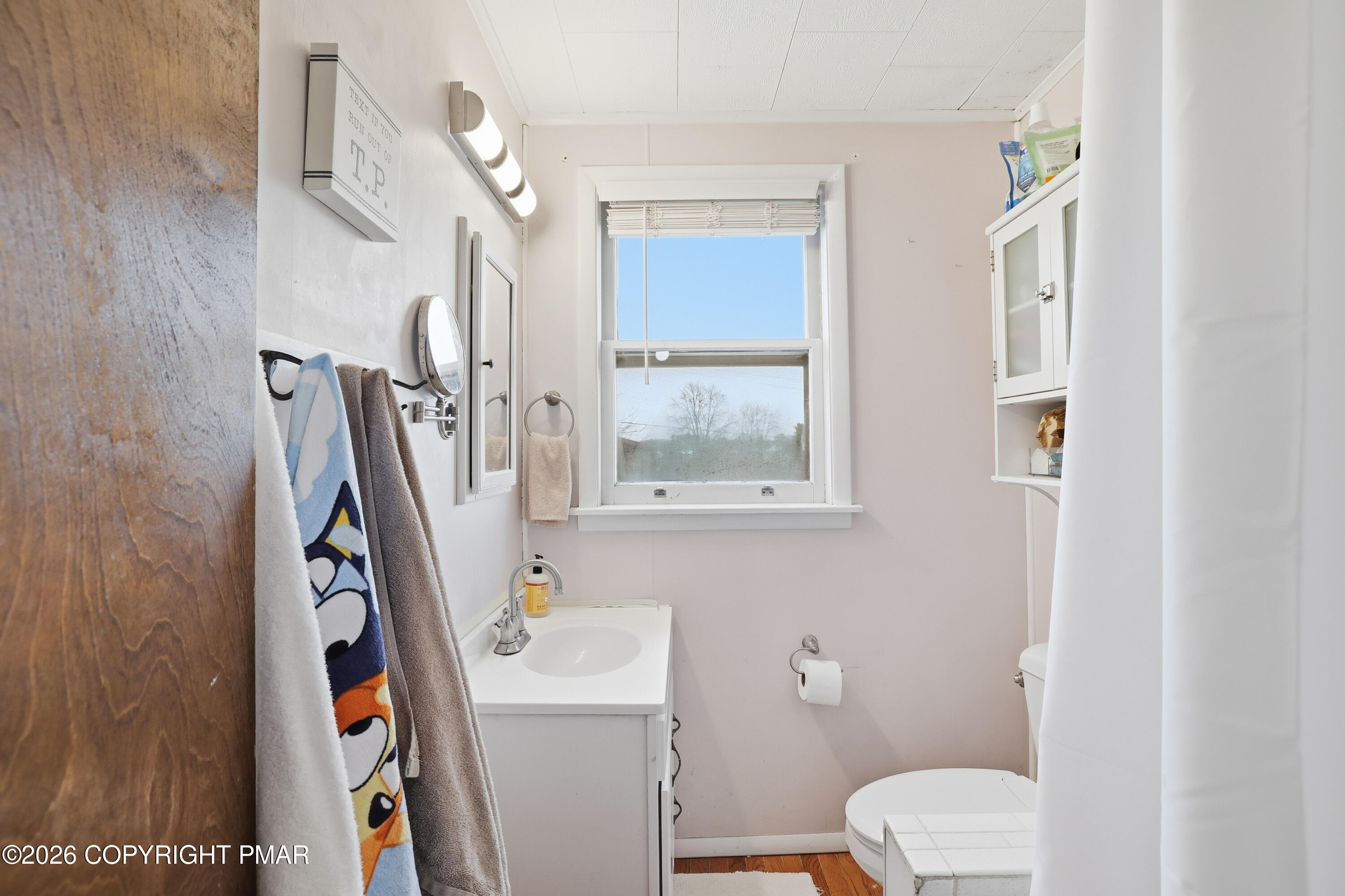 740 7th Avenue Bethlehem, PA 18018 - Photo 15 of 44 a bathroom with a toilet and a sink