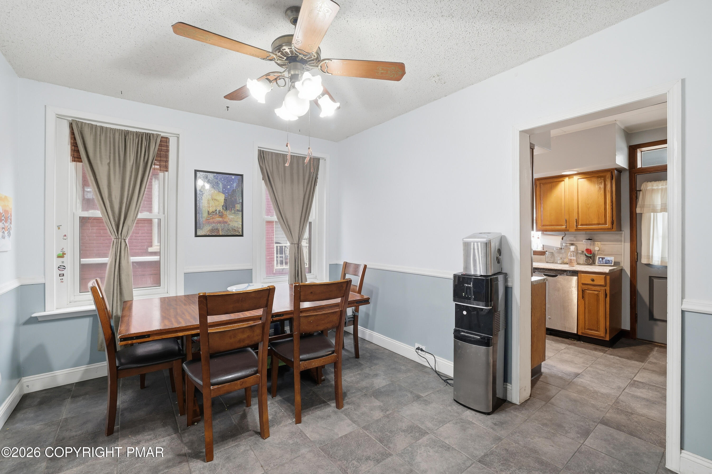 740 7th Avenue Bethlehem, PA 18018 - Photo 10 of 44 a view of a dining room with furniture and chandelier
