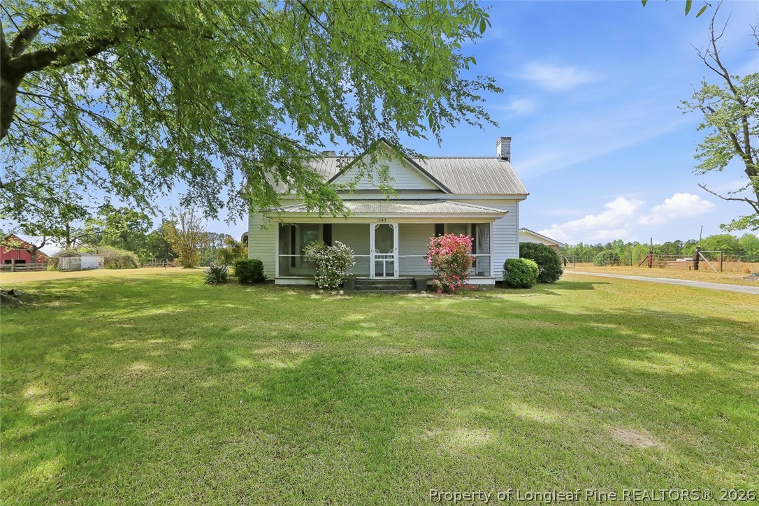 249 Nicholson Road Rockingham, NC 28379 - Photo 2 of 47 a front view of a house with a yard