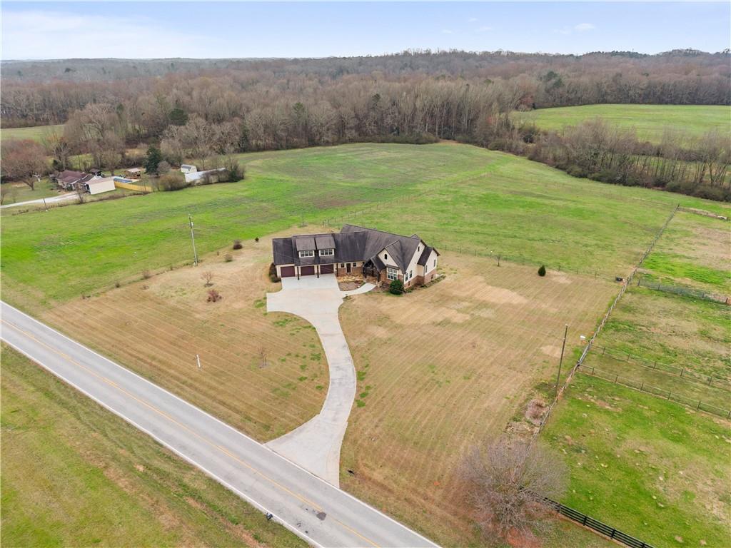 725 County Farm Road Jefferson, GA 30549 - Photo 57 of 66 a view of a swimming pool and a yard