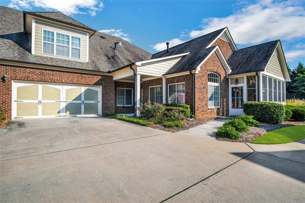 OUTSTANDING HOME IN GATED BROOKHAVEN AT LANIER RIDGE! ACTIVE 55+ COMMUNITY