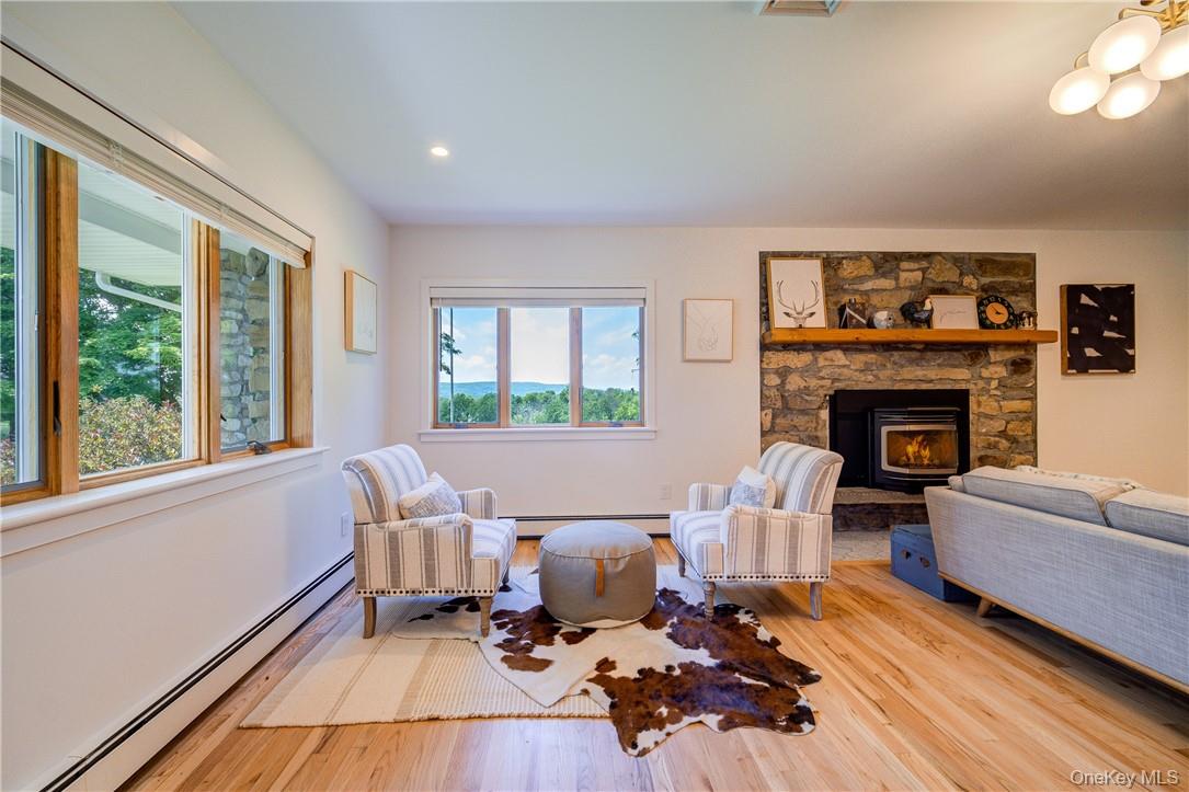90 Onderdonk Road Warwick, NY 10990 - Photo 4 of 32 Enter in from the porch to this inviting living room with pellet stove insert for chilly nights!