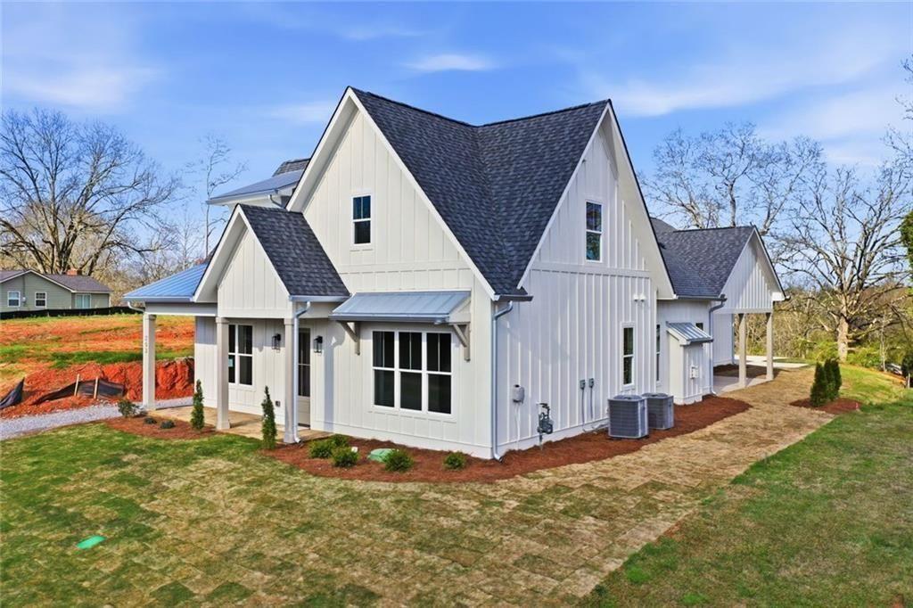 253 Northridge Road Ball Ground, GA 30107 - Photo 2 of 37 a view of a house with a yard