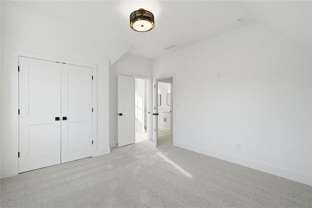 253 Northridge Road Ball Ground, GA 30107 - Photo 25 of 37 a view of an empty room