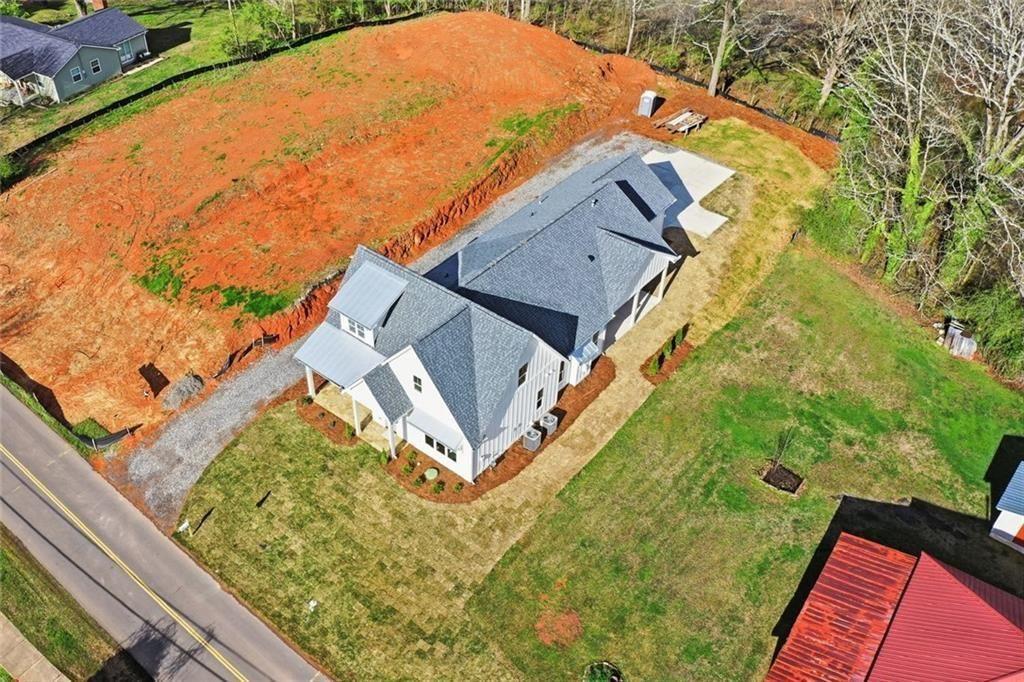 253 Northridge Road Ball Ground, GA 30107 - Photo 33 of 37 a aerial view of a house with a yard
