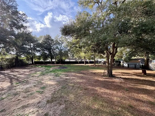 a kitchen with a sink stove and refrigerator