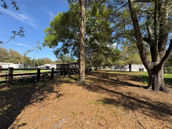 a bathroom with a toilet a sink and a mirror