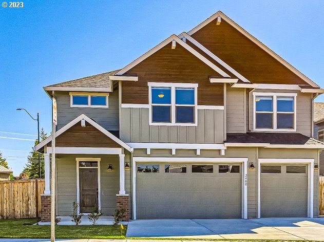 2400 South Eagle Ridge Drive Ridgefield, WA 98642 - Photo 1 of 34 a front view of a house with yard