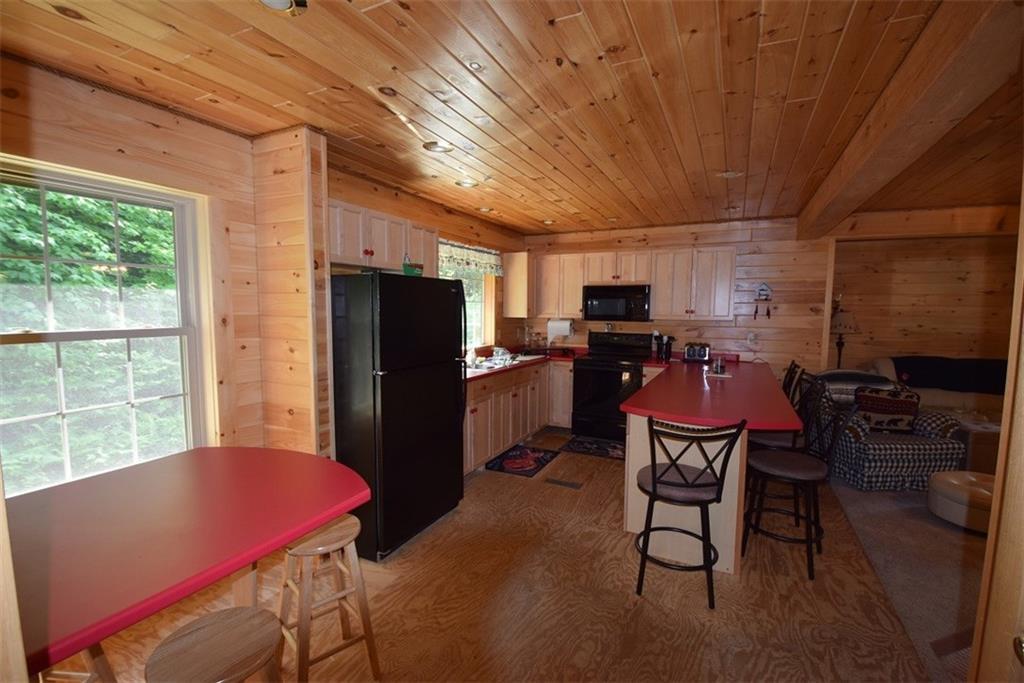 85 Gardner Point Road Mount Chase, ME 04765 - Photo 10 of 35 From the hallway looking towards the...