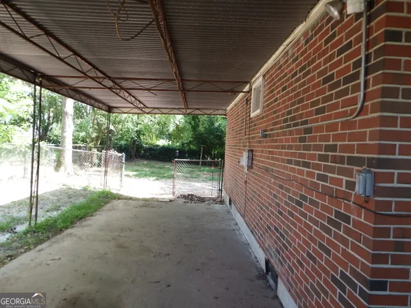 a view of a pathway with a backyard