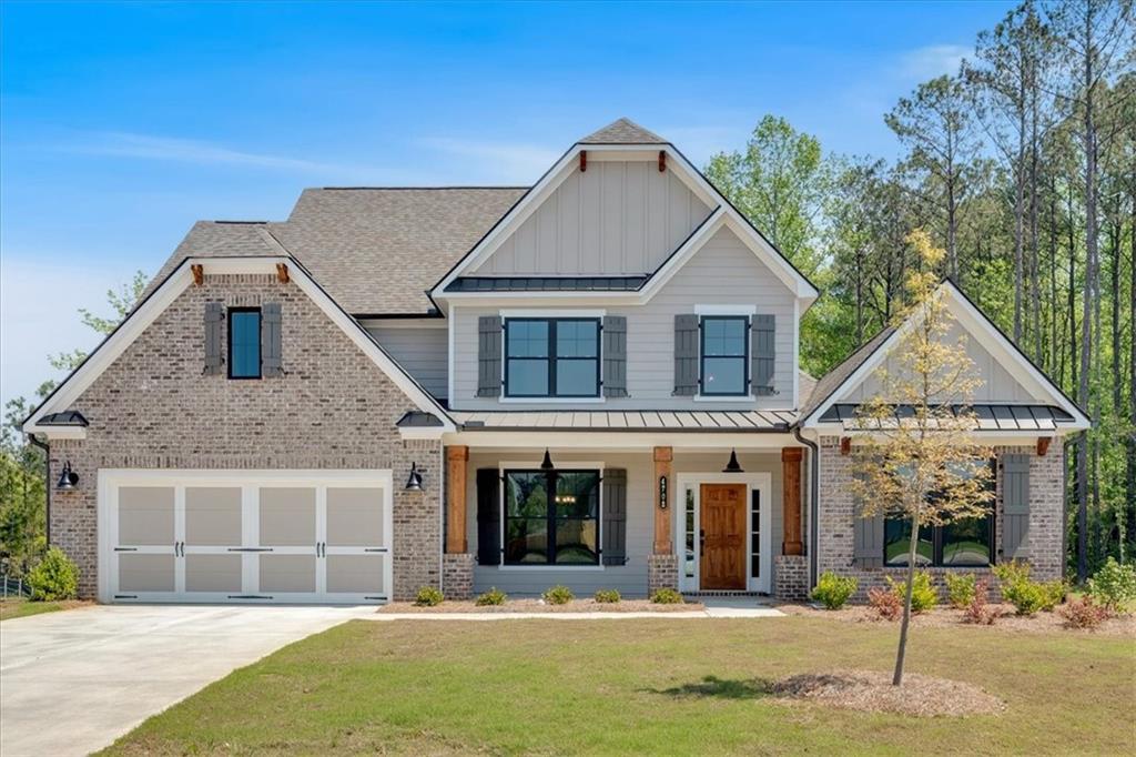 4708 Cooling Water Circle Powder Springs, GA 30127 - Photo 1 of 1 a front view of a house with a yard