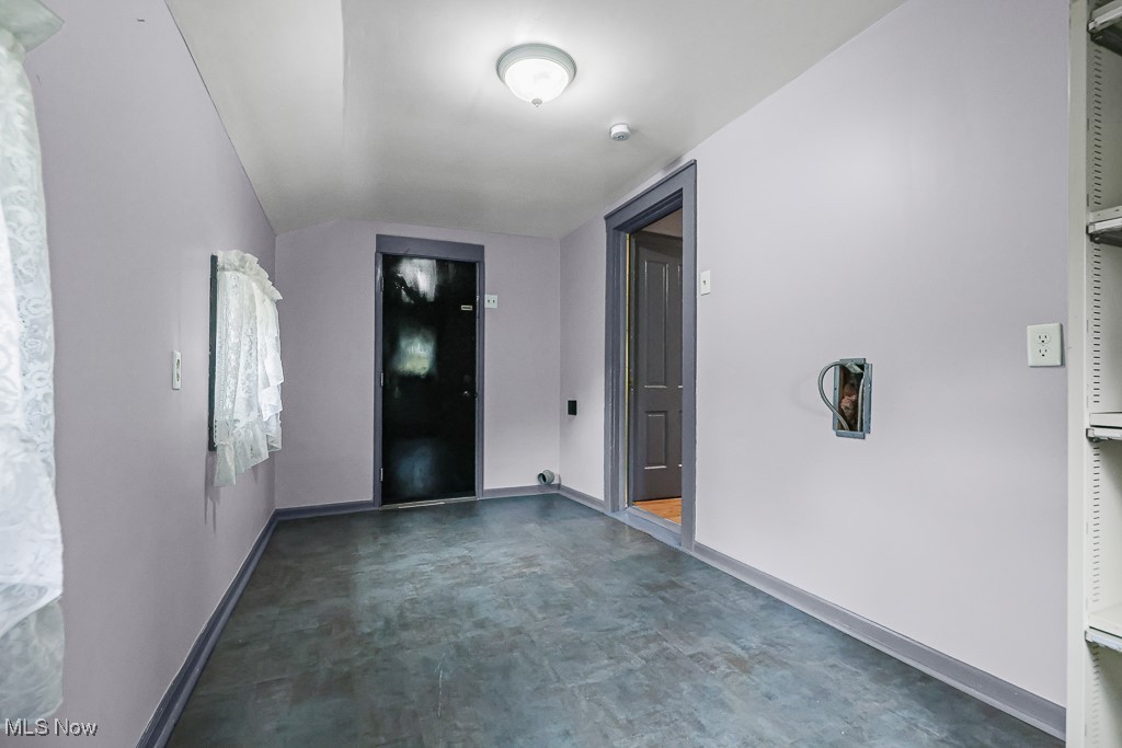 1425 Killian Road Akron, OH 44312 - Photo 19 of 41 Laundry with baseboards and dark floors