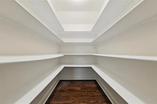 a view of an empty walk in closet