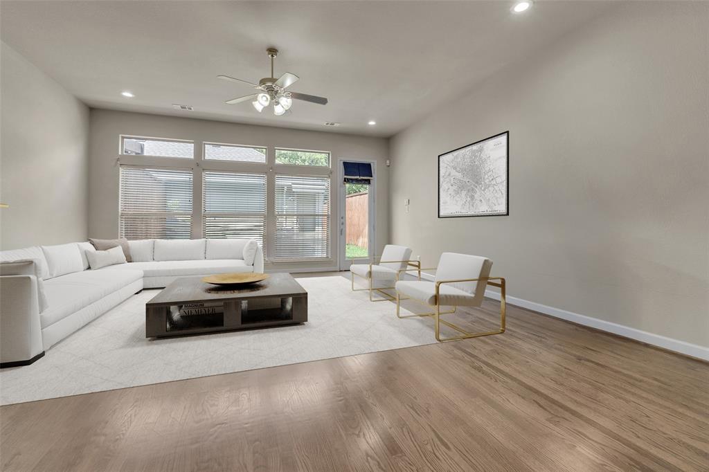 2407 Knight Street Dallas, TX 75219 - Photo 14 of 24 a living room with furniture and large windows