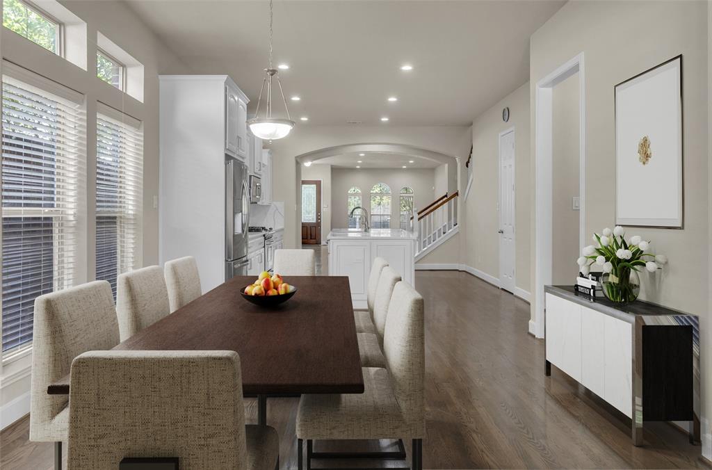 2407 Knight Street Dallas, TX 75219 - Photo 10 of 24 a view of a dining room with furniture and wooden floor