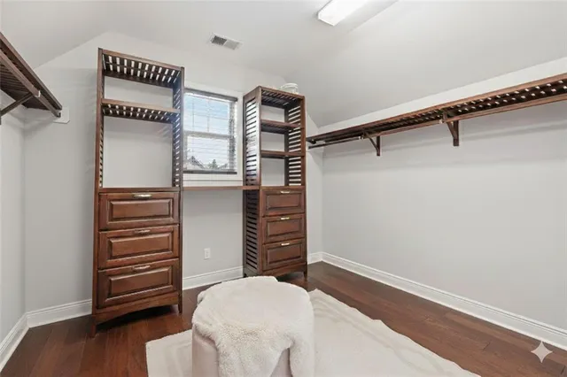 a view of table and chairs under an umbrella