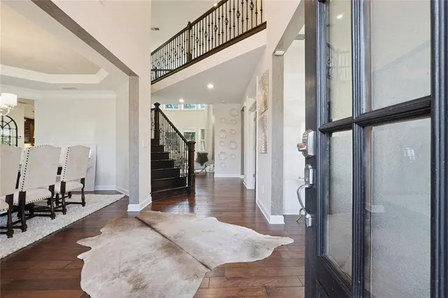 a living room with furniture fireplace and window