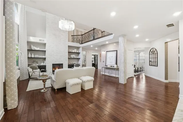 a kitchen with stainless steel appliances granite countertop a stove and a microwave