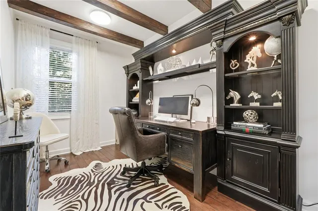 a bathroom with a sink a toilet and shower curtain