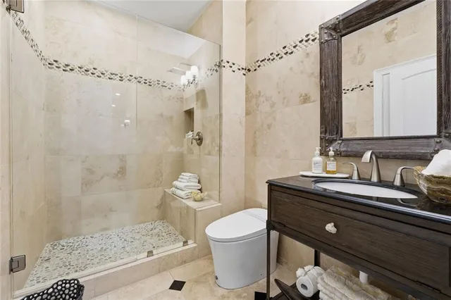 a view of a dining room and hall with wooden floor
