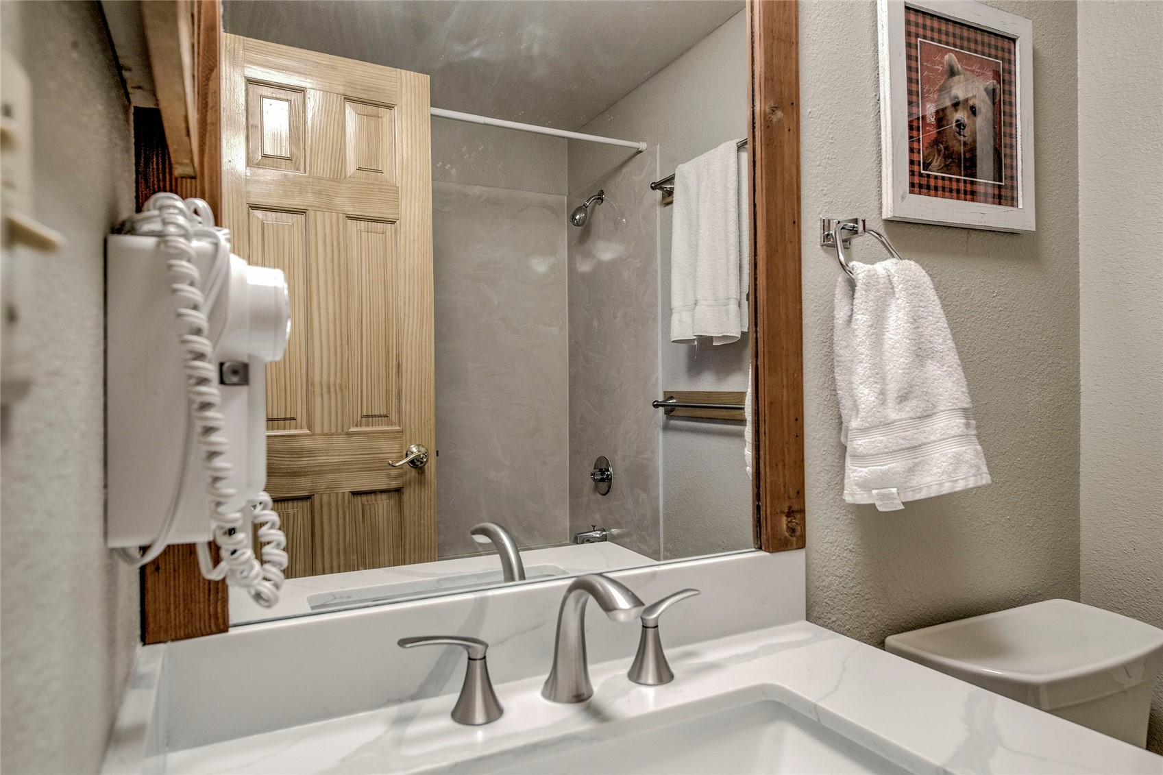 187 Fuller Placer Road, Unit B Breckenridge, CO 80424 - Photo 21 of 33 a bathroom with a sink and a mirror