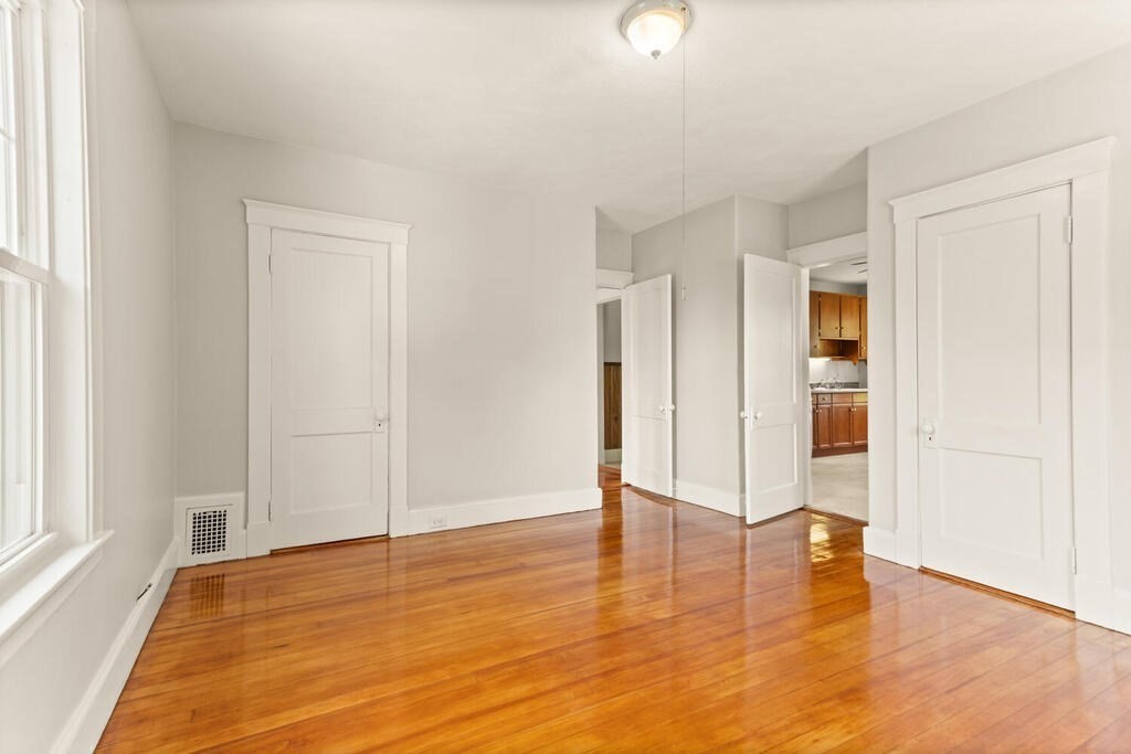 14-16 Harding Road Norwood, MA 02062 - Photo 8 of 31 a view of empty room with wooden floor