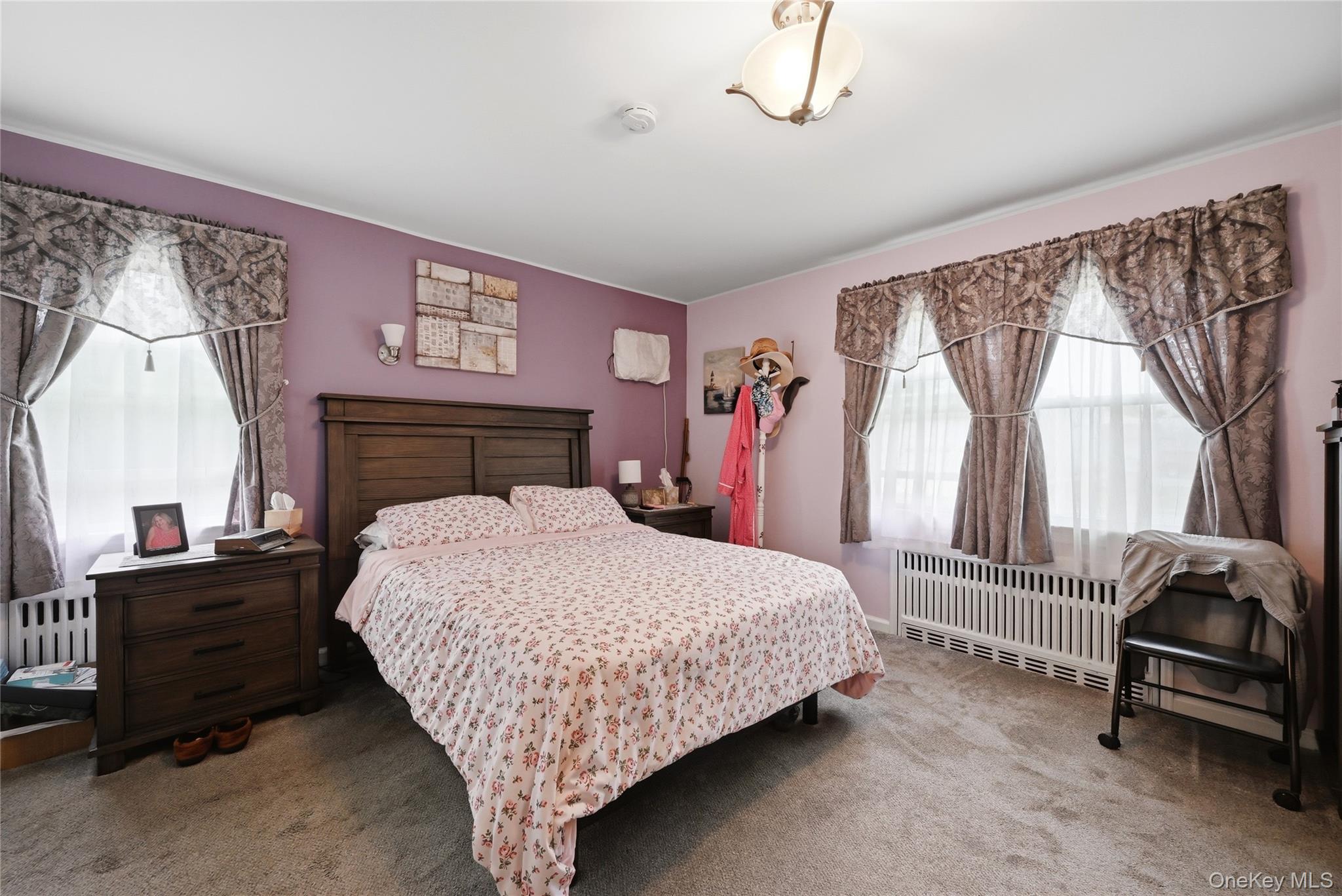 41 Lane Street Lindenhurst, NY 11757 - Photo 19 of 35 Primary - Bedroom #2 - first floor. Hardwood floors under carpet