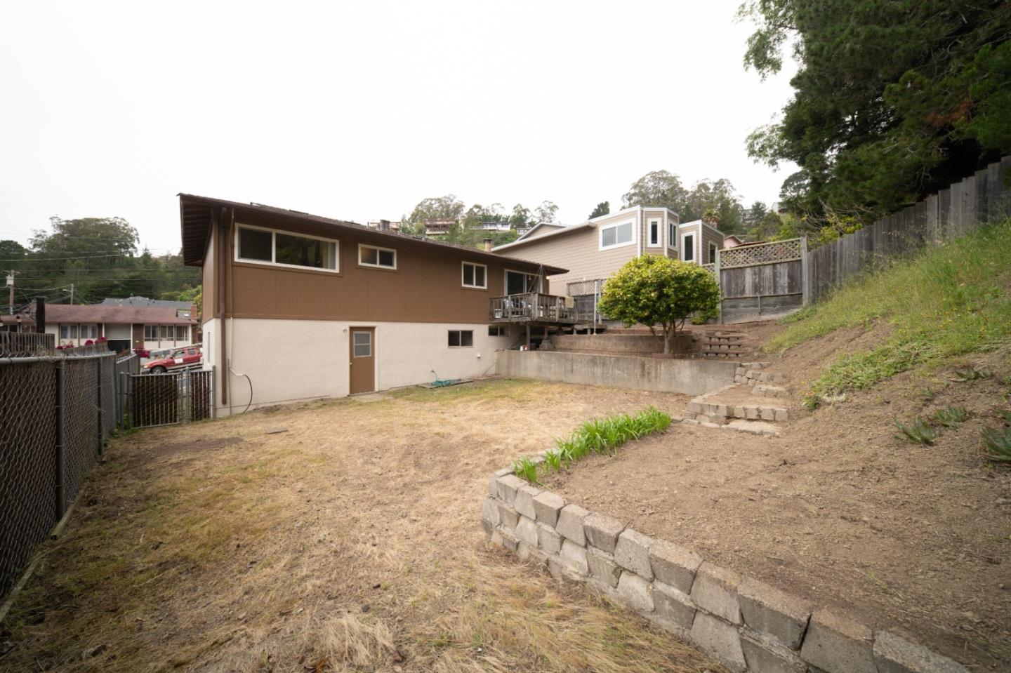 1287 Lerida Way Pacifica, CA 94044 - Photo 46 of 52 a pathway of a house with backyard