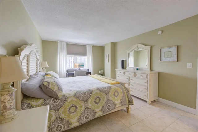 a balcony with furniture and rug