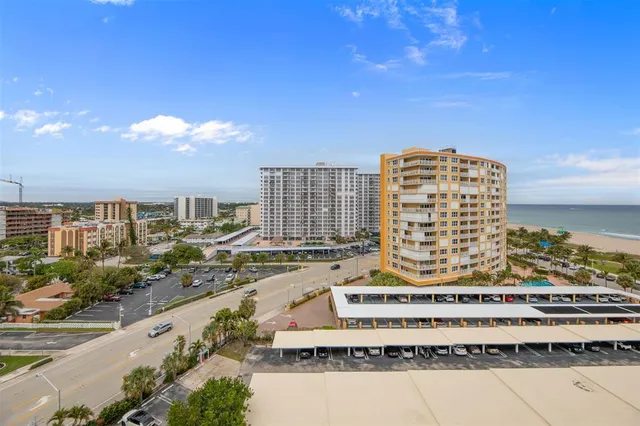 a view of a balcony with furniture