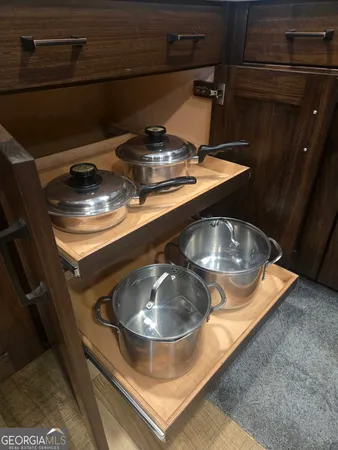 a kitchen with a stove and a sink