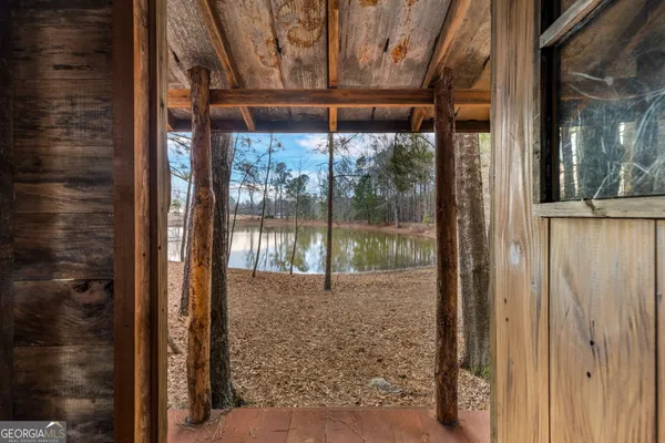 an aerial view of house with yard