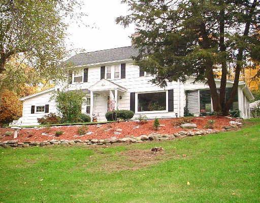 272 Old Zoar Road Monroe, CT 06468 - Photo 1 of 1 a front view of house with yard and green space