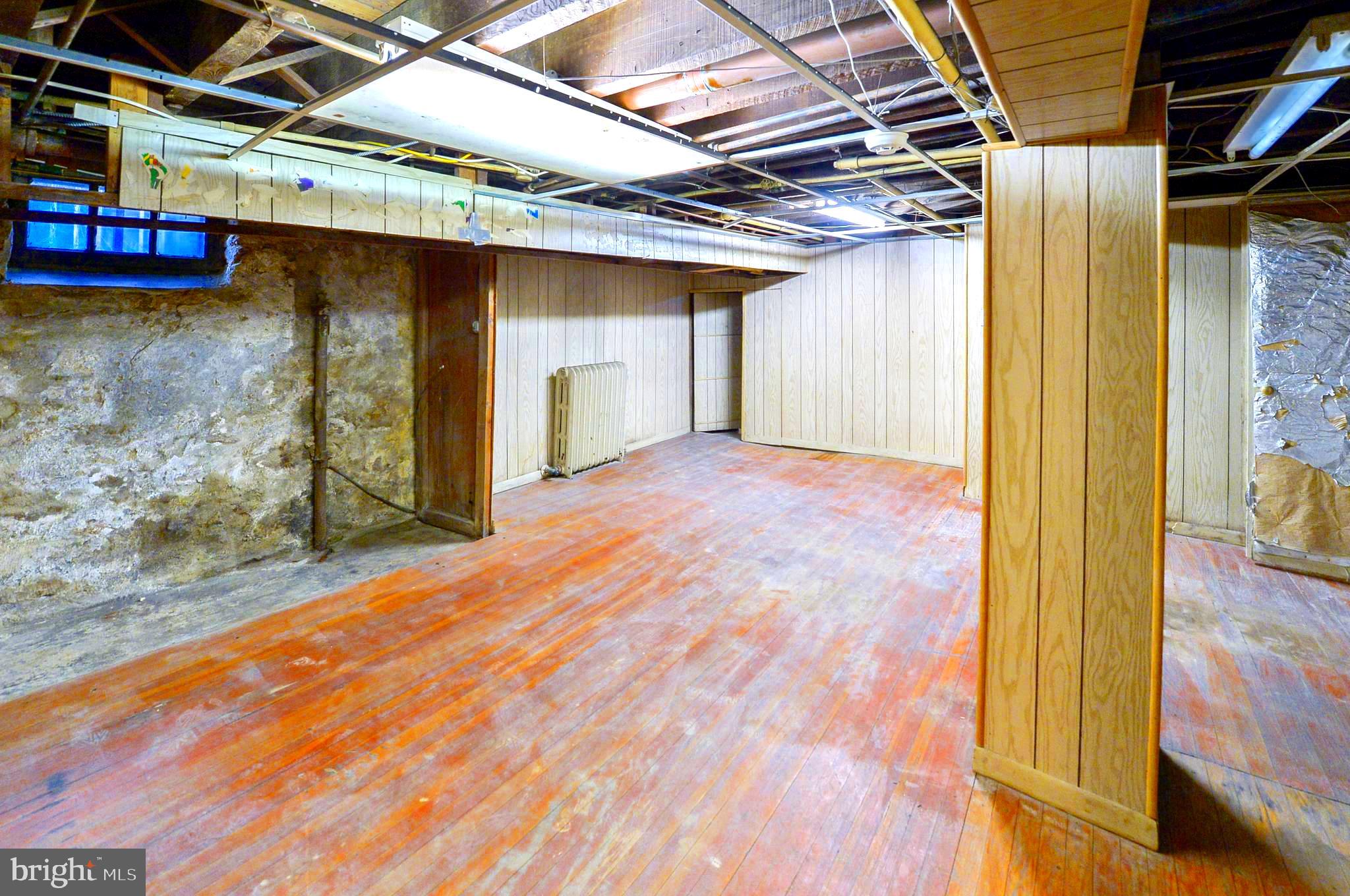 7133 Cresheim Road Philadelphia, PA 19119 - Photo 40 of 76 Semi-finished portion of basement with hardwood fl