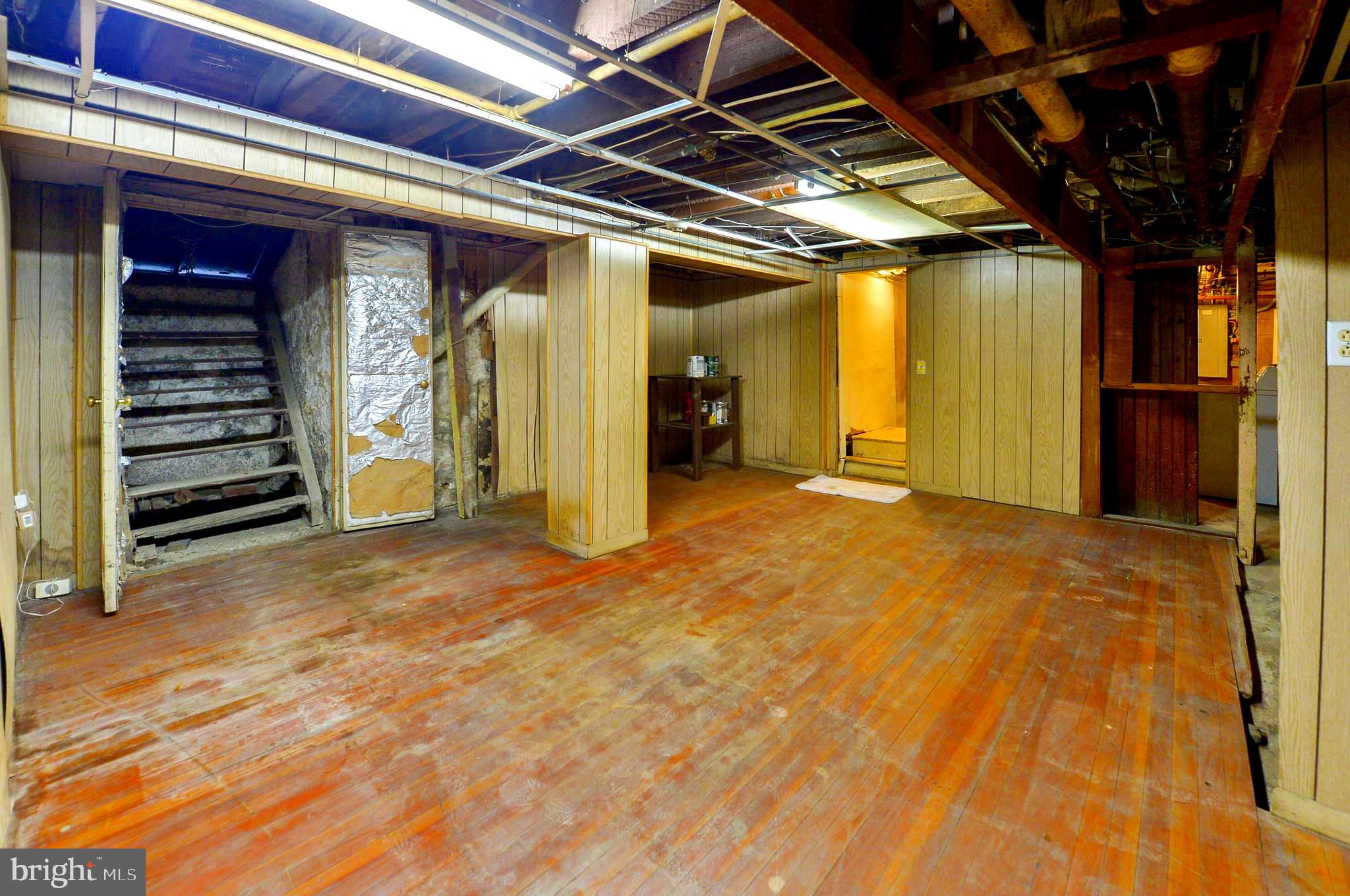 7133 Cresheim Road Philadelphia, PA 19119 - Photo 41 of 76 basement with hardwood fl and bilko door exit